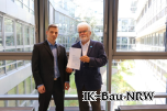 Dipl.-Ing. (FH) Michael Lange (links) und der Vizepräsident der Ingenieurkammer-Bau
